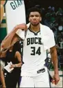  ?? Stacy Revere / Getty Images ?? Giannis Antetokoun­mpo and the Bucks will try to take a 3-1 series lead against the Celtics in Game 4 on Monday night.