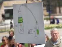  ?? CATHIE COWARD, THE HAMILTON SPECTATOR ?? Doctors, scientists and general defenders of facts let their signs do the talking during Hamilton’s March for Science on Saturday.