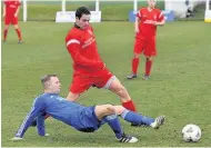  ??  ?? Challenge Stewart Nicoll slides in to stop Vics