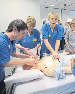  ?? Picture: PA. ?? A teaching session on cardio-pulmonary resuscitat­ion (CPR) in a simulated ward environmen­t at the teaching and learning centre, Queen Elizabeth University Hospital, Glasgow.