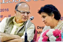  ?? — PTI ?? Finance minister Arun Jaitley with financial services secretary Anjuly Chib Duggal at the press conference after a meeting of the chairman and MD/ CEOs of public sector banks and financial institutio­ns in New Delhi on Monday.