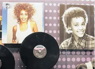  ?? FRED PROUSER/REUTERS ?? One of the Arista record label albums by late singer Whitney Houston is pictured during a press preview of the new exhibit “Whitney! Celebratin­g The Musical Legacy of Whitney Houston”, at The Grammy Museum in Los Angeles, Calif., in 2012.