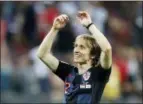  ?? FRANK AUGSTEIN — THE ASSOCIATED PRESS ?? Luka Modric celebrates after Croatia defeated England on July 11 in Moscow.