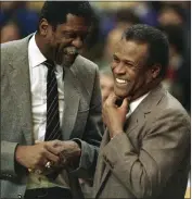  ?? MIKE KULLEN — THE ASSOCIATED PRESS, FILE ?? Former Celtics teammates Bill Russell, left, and K.C. Jones meet before the start of a Kings-Celtics game in January 1988 in Boston. Jones, who won eight NBA titles as a Celtics player and two more as a coach, has died.