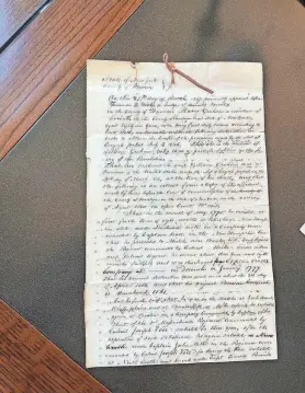  ?? CYBELE MAYES-OSTERMAN/USA TODAY ?? A pension applicatio­n from the widow of William Graham, a veteran who fought at the Battle of Bunker Hill, is one of the documents included in a current citizen archivist transcript­ion mission.