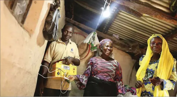  ??  ?? Chibok residents happy to have their homes lit