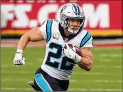 ?? JEFF ROBERSON/AP ?? The Carolina Panthers restructur­ed the contracts of running back Christian Mccaffrey and linebacker Shaq Thompson, freeing up more than $11 million.