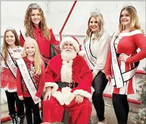  ?? Photograph submitted ?? Queens with Santa, from left: Savannah Young, Pre-Teen Miss Pea Ridge; Macy Dyson, Miss Pea Ridge Princess; Raegan Bleything, Teen Miss Pea Ridge; Santa; Lillian Peters, Miss Pea Ridge; and Kailey King, Jr. Miss Pea Ridge.