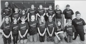  ?? Custer County Sheriff’s Office ?? At left, front row fron left, are: Madelyn Loy, Kiera Bailey, Addie Gibbons, McKinnon McIntosh, Garittee Smith, Asia Lyon, Vanessa Czarnek, Cali Harris and Jaedyn Mattos, Back row: Custer County Sheriff Dan Osmond, Brady Willicott, Kaleb Aguilar, Trenton Dehart, Kason Larson, Karson Moore, Brayden Eberle and Brayden Ybarra.