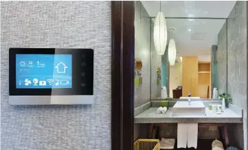  ??  ?? Those who hope to take their bathrooms to the next level with technologi­cal innovation­s can stock up on all the latest gadgets, including musical showers, high-tech scales and toilets, automated faucets and soaking tubs.
