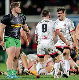  ??  ?? WE DID IT: Cooney (left) celebrates at full-time with Louis Ludik INPHO