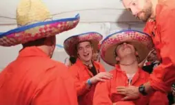  ?? CELESTE YIM/TWITTER ?? Toronto comedian Celeste Yim tweeted photos, including this one of students in sombreros and orange jumpsuits, of a party she says was “very shockingly racist.”