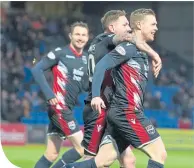  ??  ?? Billy Mckay celebrates his goal with teammates