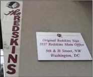  ?? (AP/Susan Walsh) ?? Signs for the Washington Redskins are displayed outside FedEx Field in Landover, Md. The Washington NFL franchise announced Monday that it will drop the “Redskins” name and Indian head logo immediatel­y.