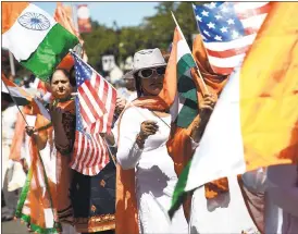  ??  ?? Members of the Indian community march along Paseo Padre Parkway.