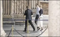  ?? MASSIMO PERCOSSI / ANSA ?? President Donald Trump’s assistant and daughter, Ivanka Trump, holds hands with her husband, White House senior adviser Jared Kushner, as they enter the Pantheon for a private visit in Rome on Wednesday.