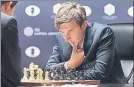  ?? FOTO: AP ?? Sergey Karjakin estudia la partida