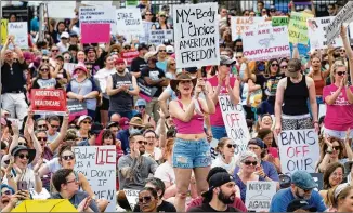  ?? BEN GRAY FOR THE ATLANTA JOURNAL-CONSTITUTI­ON ?? Meredith Upton (center) joins hundreds near the Georgia state Capitol in Atlanta on Saturday to rally in support of abortion rights.