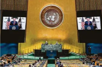  ?? Eskinder Debebe / United Nations / AFP via Getty Images ?? President Donald Trump appears on screens as he address the U.N. General Assembly virtually. Trump urged the U.N. to hold China “accountabl­e” for failing to contain COVID-19.