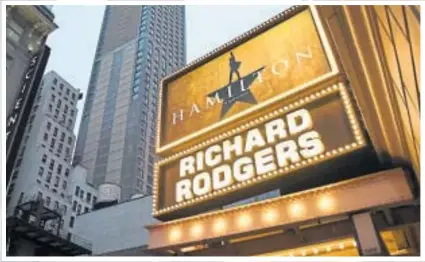  ?? ?? Reuben Joseph, left, arrived in New York in 2017 and went straight to the Richard Rodgers Theatre to take a photo of the Hamilton sign, above