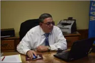  ?? NICHOLAS BUONANNO - MEDIANEWS GROUP FILE ?? Watervliet Mayor Charles Patricelli sits behind his desk at City Hall.