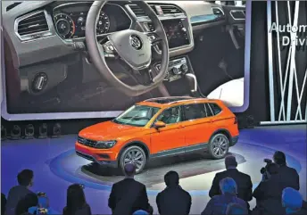  ?? PROVIDED TO CHINA DAILY ?? A VW model catches visitors’ eyes at an auto show in Detroit, the United States.