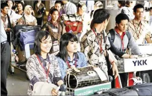  ?? AFP ?? Some 200 Indonesian nurses and caregivers arrive at Narita Internatio­nal Airport in Chiba prefecture, suburban Tokyo.