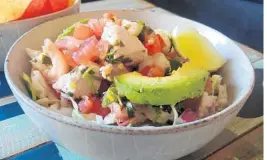  ?? AMY DREW THOMPSON/ORLANDO SENTINEL ?? It is often debated whether ceviche first originated in Ecuador or Peru, though some evidence suggests its been a staple of the region for 2,000 years.