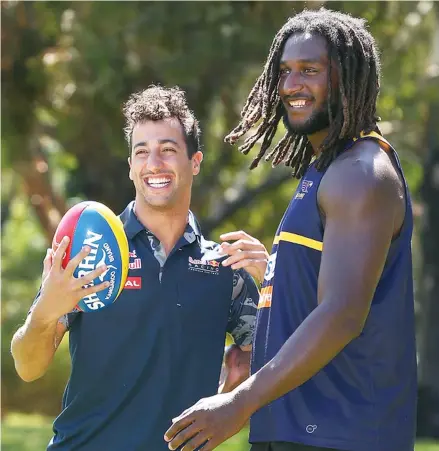  ?? Photo: Zimbio ?? Daniel Ricciardo of Australia and Red Bull Racing and Nic Naitanui of the West Coast Eagles during a West Coast Eagles AFL training session at the Wembley Sports Park in Perth, Australia.