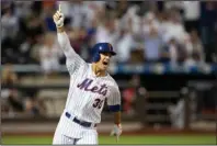  ?? The Associated Press ?? WALKOFF SINGLE: New York Mets’ Michael Conforto reacts after hitting a walkoff single Friday during the ninth inning to win against the Washington Nationals in New York.