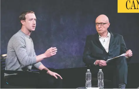  ?? MARK LENNIHAN / AP PHOTO ?? Facebook CEO Mark Zuckerberg, left, and Robert Thomson, CEO of News Corp., at a discussion about Facebook’s News Tab last October. The fight
between platforms and publishers is at once a matter of economic principle and an old-fashioned political brawl between powerful industries.