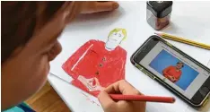  ??  ?? Hier musste Merkel digital Modell stehen: Teilweise malten die Kinder die aktuellen Nachrichte­nbilder nach einer Vorlage. Andere zeichneten aus dem Kopf.