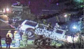  ?? WRGB (CBS-6) ?? A 2001 Ford Excursion enhanced limo owned by Prestige Limousine is pulled from the crash scene on Oct. 6, 2018.