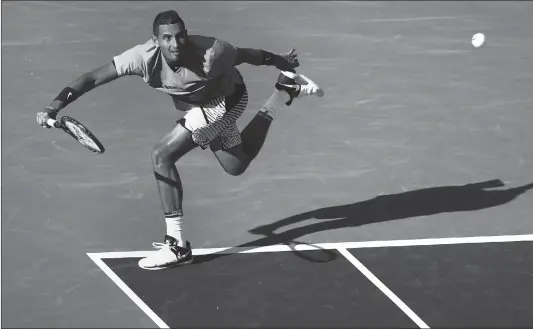  ?? Photo: AFP ?? Nick Kyrgios of Australia prepares a return during his straight- set victory against Novak Djokovic of Serbia at the ATP Indian Wells Masters on Wednesday.