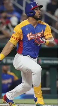  ?? (AP/Marta Lavandier) ?? Anthony Santander (above) and Eugenio Suarez had two hits each for Venezuela on Tuesday in a 4-1 victory over Nicaragua in Group D play at the World Baseball Classic in Miami.