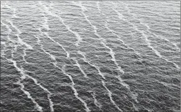  ?? GERALD HERBERT/AP 2010 ?? Oil transforme­d by the environmen­t is seen in the Gulf of Mexico by the Louisiana coast.