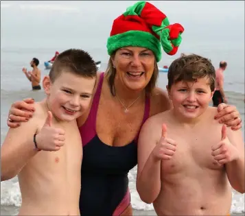  ??  ?? Tommy Power, Fiona Power and Jamie Doyle who took part in the Polar Plunge at Rosslare Strand on Saturday at noon in aid of Wexford Special Olympics.