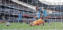  ?? | Reuters ?? AYMERIC Laporte scores Manchester City’s second goal against Newcastle United at the Etihad Stadium yesterday. City demolished the Magpies 5-0.