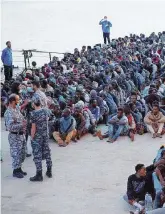  ?? Ansa ?? Naufraghi soccorsi al largo della costa Libica e migranti nel porto di Tripoli