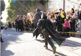  ??  ?? Right: Batman and Batkid in action.