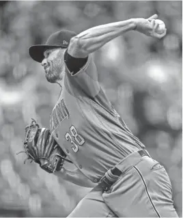  ?? AP ?? Diamondbac­ks starter Robbie Ray pitched seven dominating innings against the Brewers on Thursday in Milwaukee. He lowered his road ERA to 0.81.