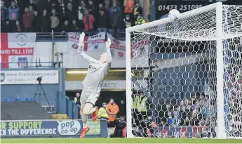  ?? ?? Thorben Hoffmann can’t stop Ipswich’s opener.