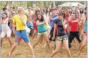  ??  ?? Ross Lynch (“Austin & Ally”) and Maia Mitchell (“The Fosters”) star in “Teen Beach 2” (7 p.m., Disney), which offers fantastica­l, nonsensica­l diversion.