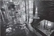  ?? AFP ?? Rainfall from Hurricane Ida flood the basement of a restaurant in the Bronx borough of New York City on Wednesday.