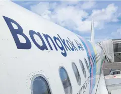  ??  ?? A Bangkok Airways jet sits ready on the apron at Samui airport.