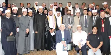  ??  ?? Saudi and internatio­nal delegates pose at the opening of the 30th session of the Internatio­nal Conference of Latin American and Caribbean Muslims in Sao Paulo on Friday. (SPA)