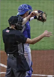  ?? CHRIS O’MEARA - TTHE ASSOCIATED PRESS ?? Home plate umpire Kaleb Devier calls a strike during a Low A Southeast League baseball game between the Dunedin Blue Jays and the Tampa Tarpons at George M. Steinbrenn­er Field Tuesday, May 4, 2021, in Tampa, Fla.