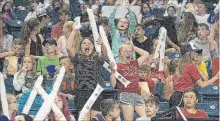  ?? BOB TYMCZYSZYN THE ST. CATHARINES STANDARD ?? Fans cheer on Team Canada against Ecuador at the FIBA U18 Americas Championsh­ip at Meridian Centre in St. Catharines Monday.