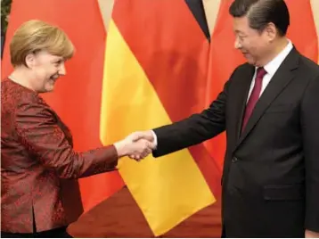  ??  ?? A file photo of German Chancellor Angela Merkel with Chinese president Xi Jinping