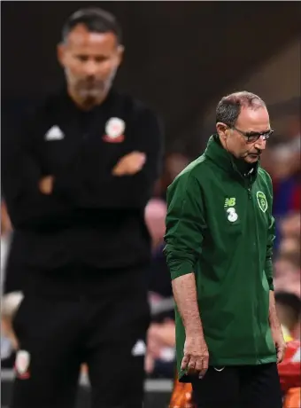  ??  ?? Republic of Ireland manager Martin O’Neill (right), and Wales manager Ryan Giggs during the UEFA Nations League match at the Cardiff City Stadium.